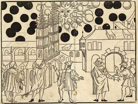 The 1566 Basel broadsheet woodcut, showing Basel Minster and the Münsterplatz beneath a sky of black and white spheres, printed by Samuel Apiarius from an account compiled by Samuel Coccius