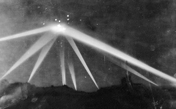 Associated Press photograph, February 25, 1942 — anti-aircraft searchlights converge on an object in the sky over Los Angeles during the "Battle of Los Angeles"