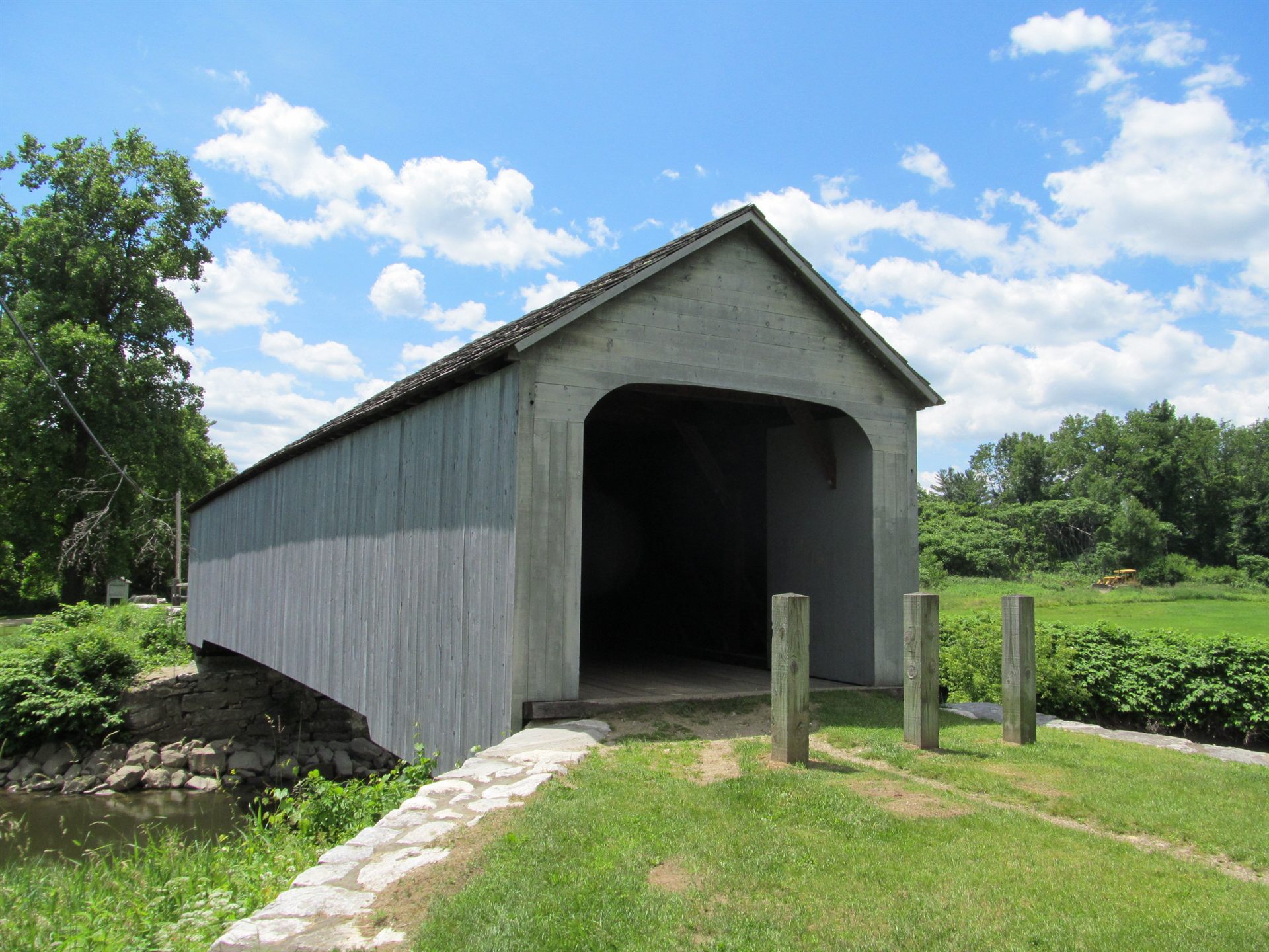 The rebuilt Old Covered Bridge over the Housatonic River in Sheffield, Massachusetts, the site of the Reed family's 1969 encounter.