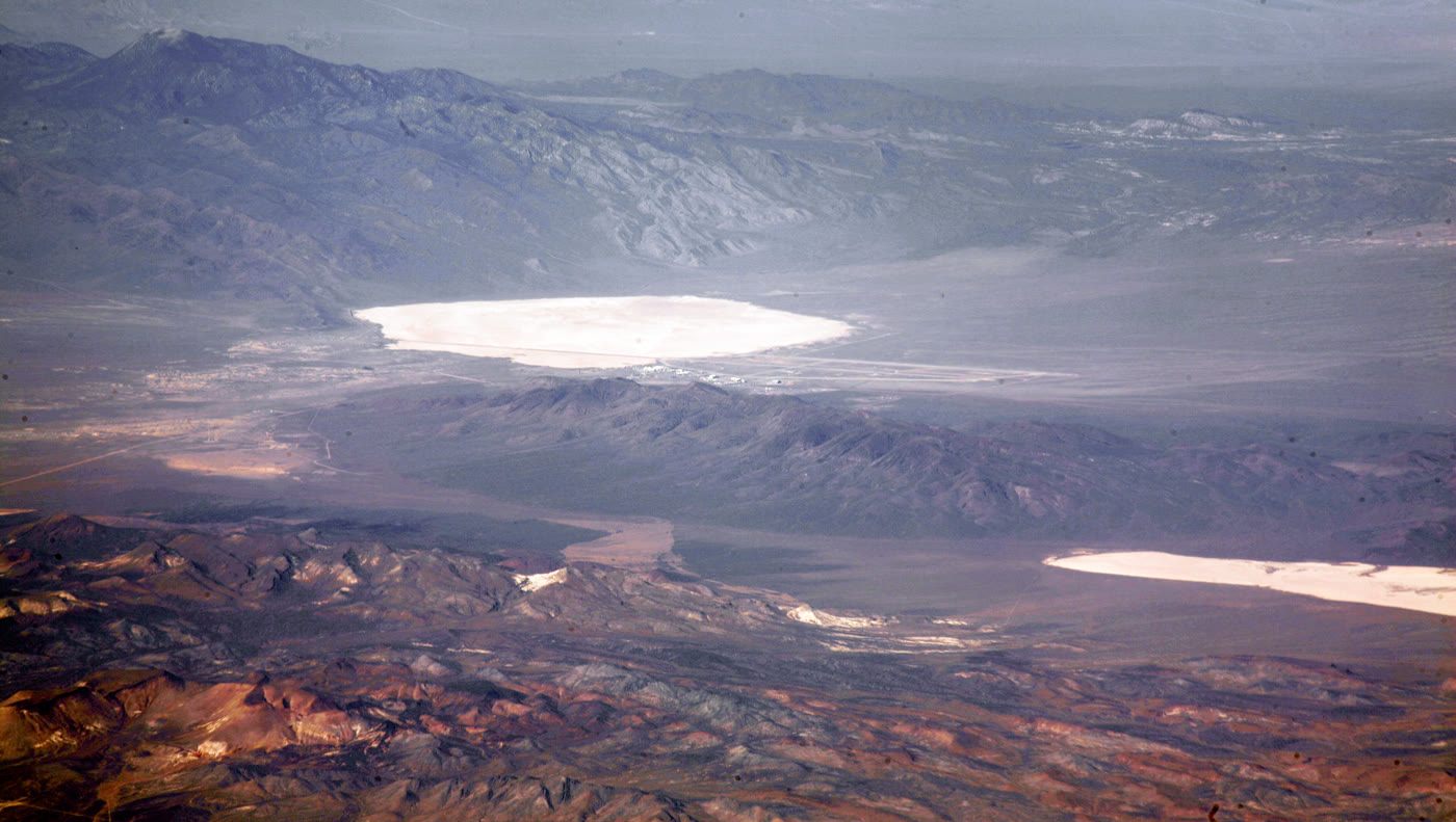 Aerial photograph of Groom Lake and Papoose Lake, Nevada — the Area 51 / S-4 vicinity where Bob Lazar claims to have worked on extraterrestrial craft