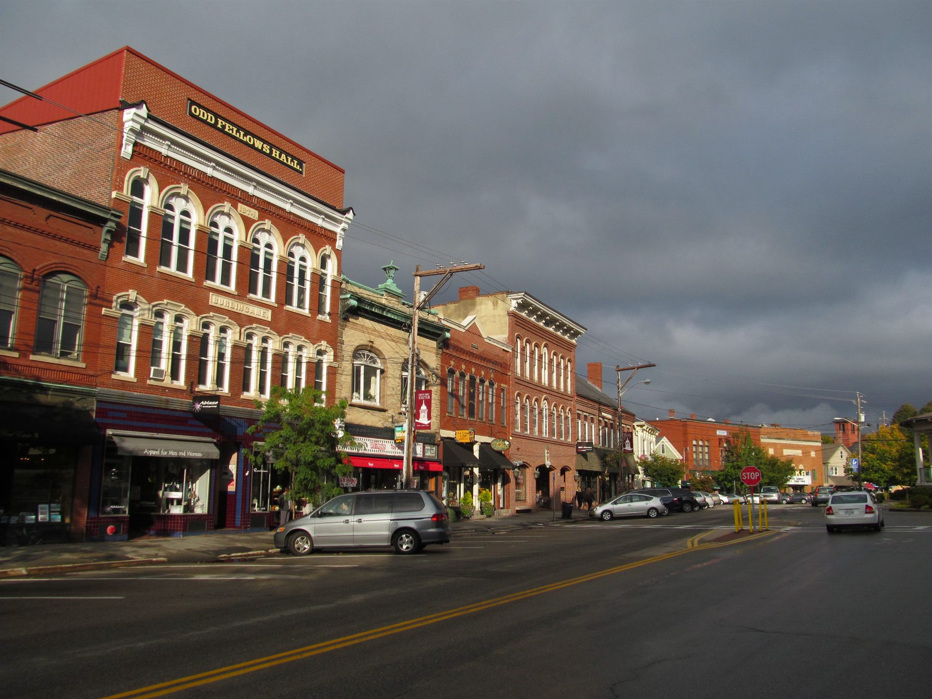 The historic Water Street commercial district in downtown Exeter, New Hampshire — the town whose police department, officers Eugene Bertrand and David Hunt, and desk officer Reginald Toland became central to the September 1965 UFO case. This photograph shows present-day downtown Exeter, not the actual rural Kensington Road sighting site a few miles south of town.