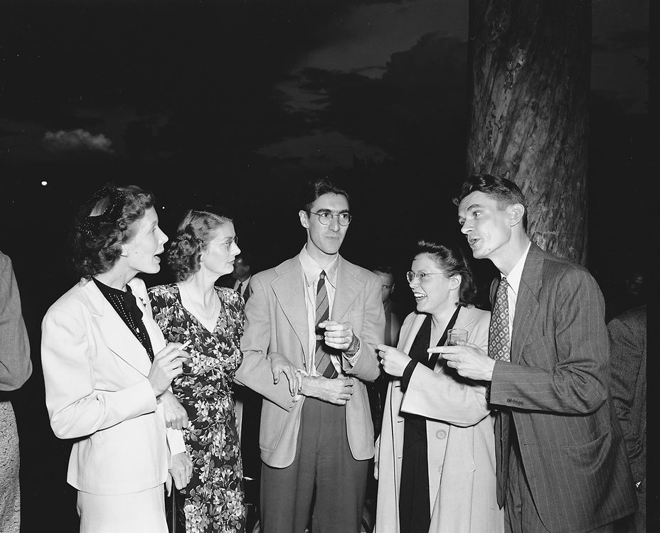 Los Alamos Laboratory scientists and staff at a social gathering at Fuller Lodge, August 1946