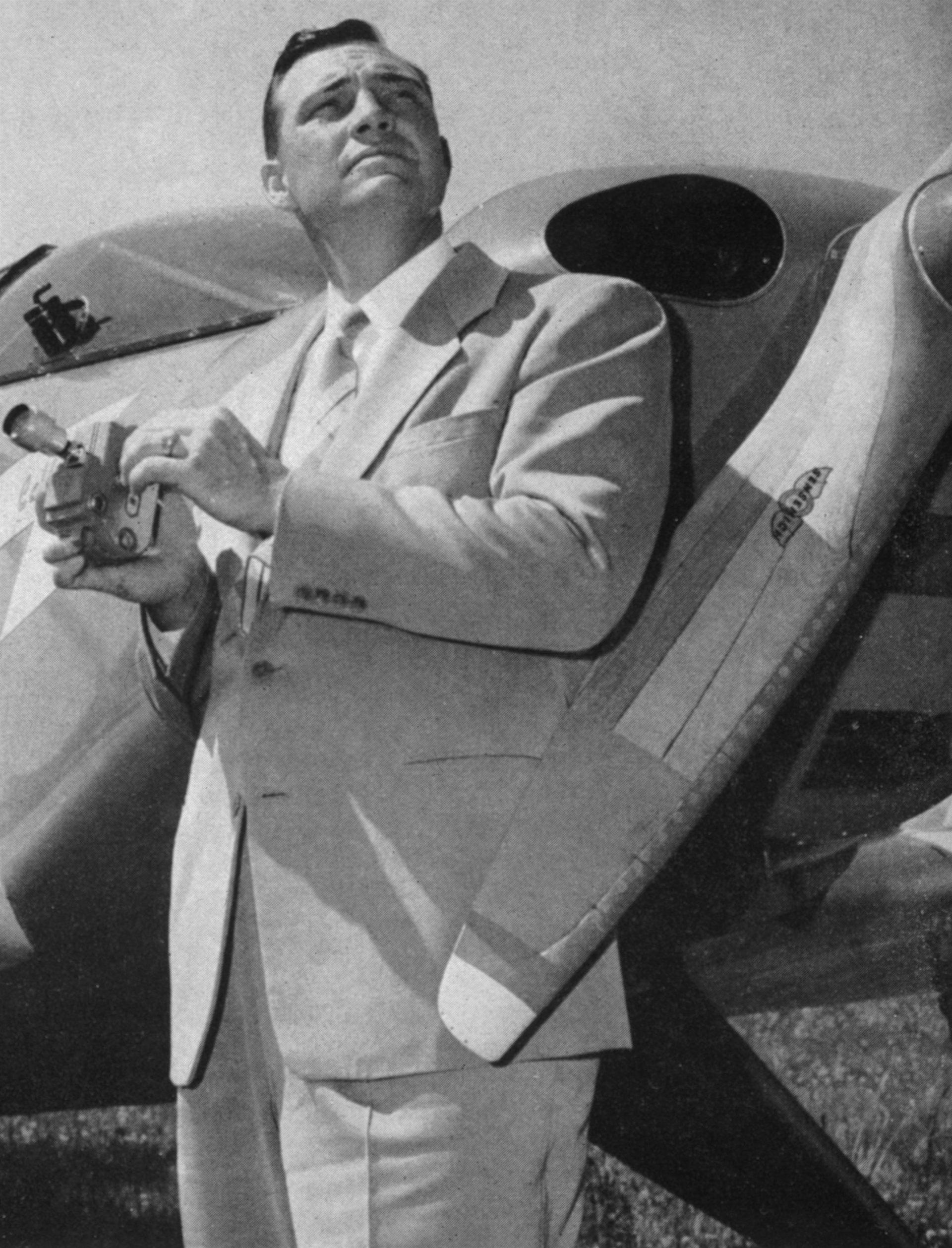 Kenneth Arnold with his private aircraft, the CallAir A-2 he was flying during his June 24, 1947 sighting that coined the term "flying saucer" (AP photo, July 8, 1947)
