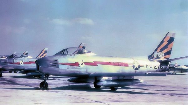A U.S. Air Force F-86 Sabre-type jet fighter of the kind based in the United Kingdom during the mid-1950s, standing in for the era and class of interceptor aircraft — not RAF Lakenheath, RAF Bentwaters, or the RAF Venom that was actually vectored during the August 1956 radar-visual UFO incident