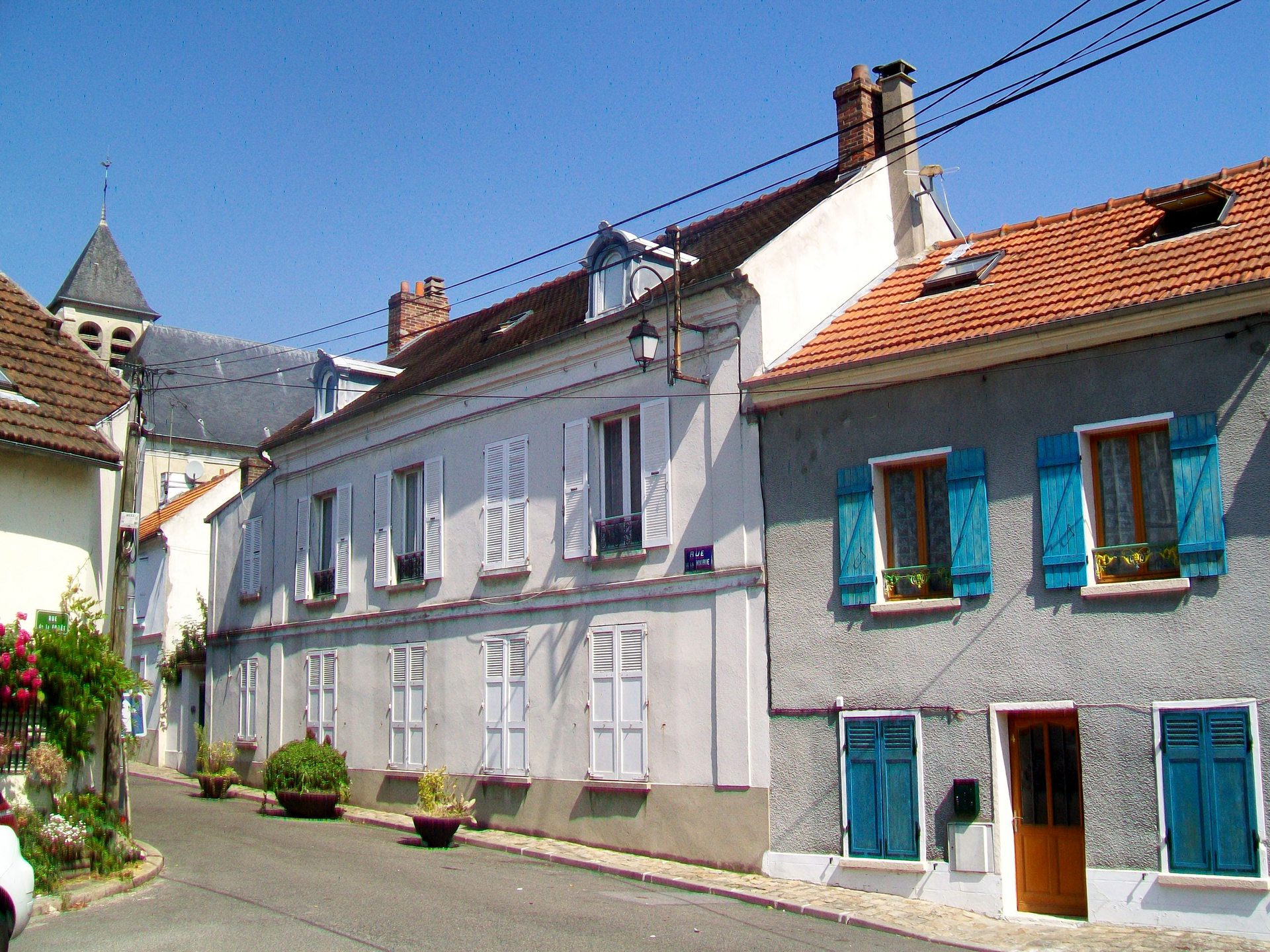 Rue de la Mairie in Maffliers, Val-d'Oise, France, looking toward the village church