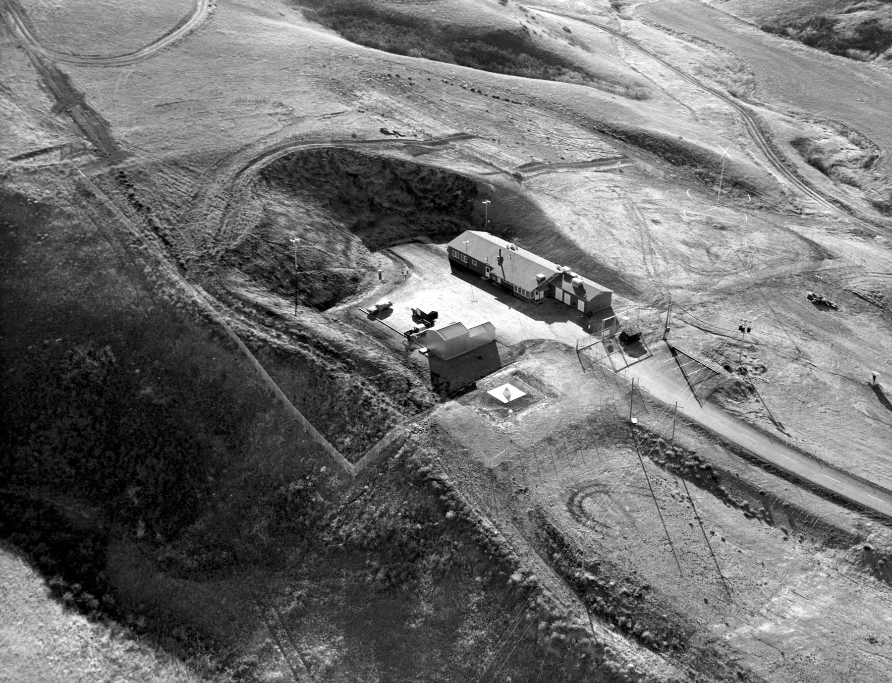 A U.S. Air Force photograph of a completed Minuteman launch control facility at Malmstrom Air Force Base, Montana, taken between 1961 and 1966 — the same type of hardened, partially underground facility involved in the March 1967 Echo and Oscar Flight shutdowns