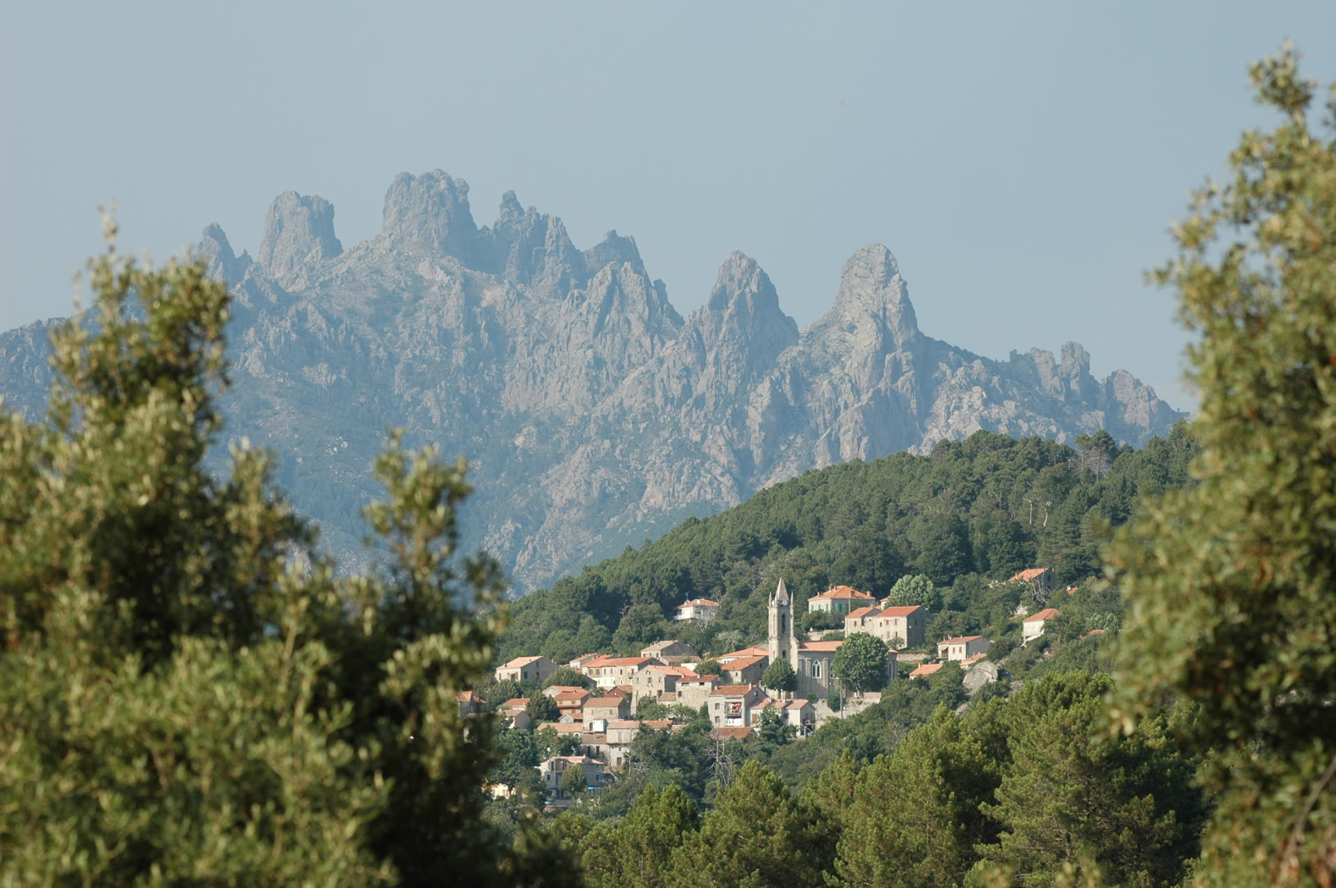 The village of Zonza, Corsica, with the Aiguilles de Bavella in the background